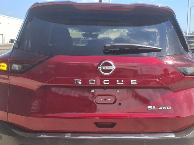 Photo of 2022 Scarlet Ember Tintcoat Nissan Rogue