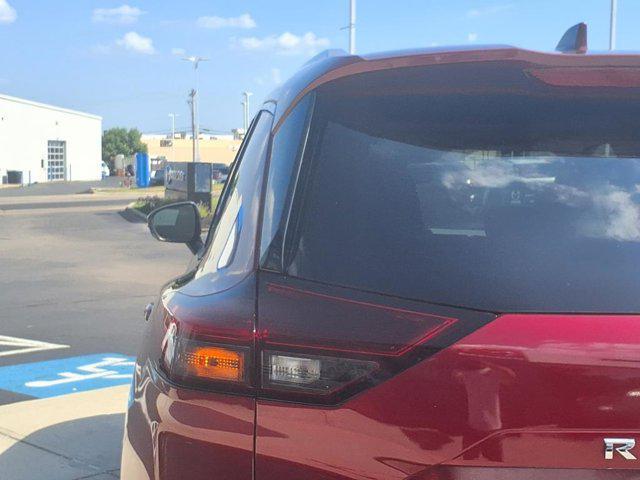 Photo of 2022 Scarlet Ember Tintcoat Nissan Rogue