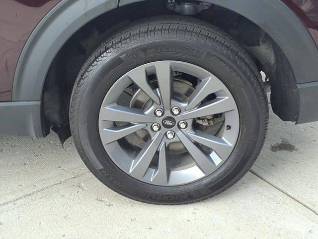 Photo of 2023 Jewel Red Metallic Tinted Clearcoat Ford Explorer