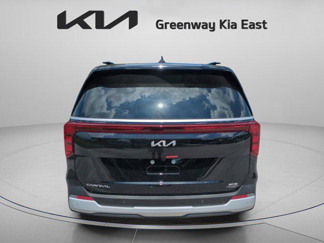 Photo of 2026 Aurora Black Pearl Kia Carnival Hybrid