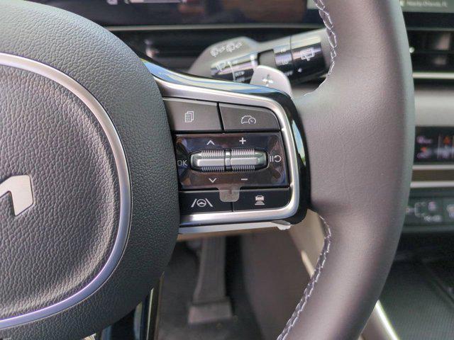 Photo of 2026 Aurora Black Pearl Kia Carnival Hybrid