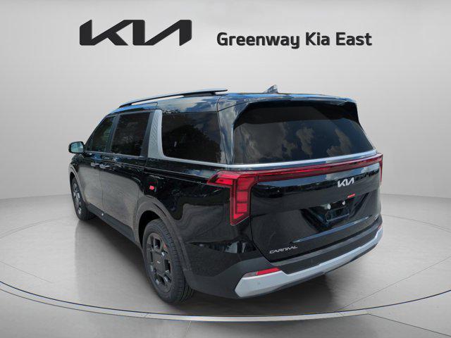 Photo of 2026 Aurora Black Pearl Kia Carnival Hybrid