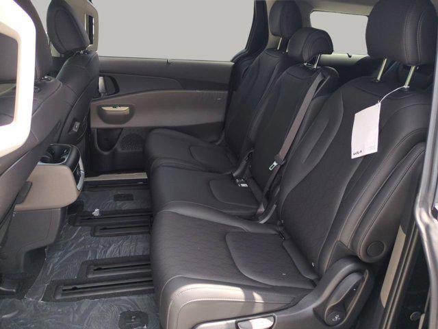 Photo of 2026 Aurora Black Pearl Kia Carnival Hybrid
