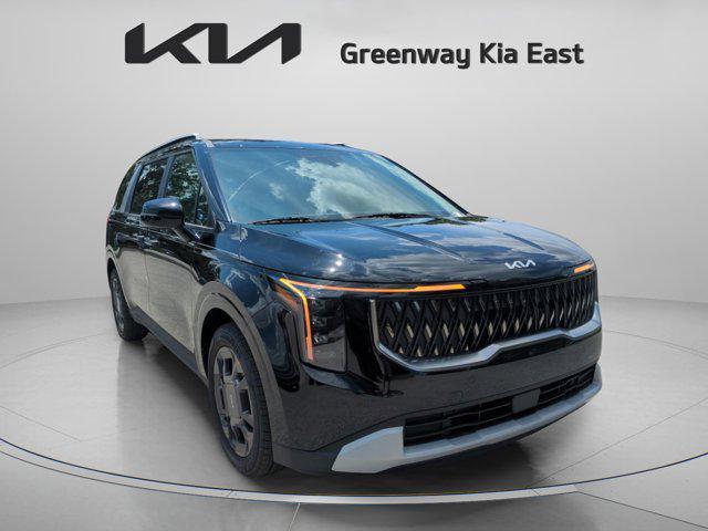 Photo of 2026 Aurora Black Pearl Kia Carnival Hybrid