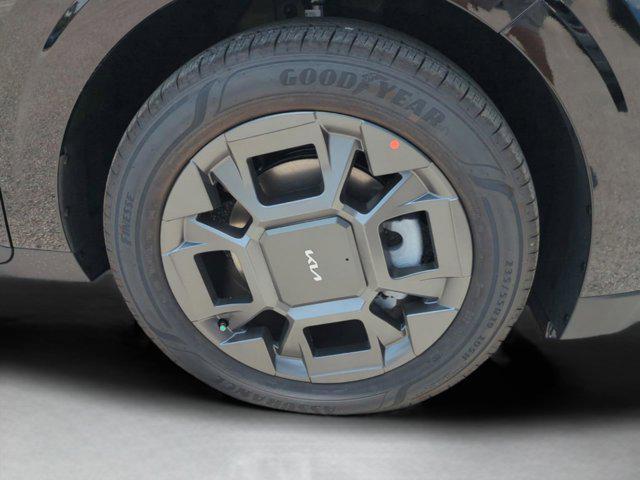 Photo of 2026 Aurora Black Pearl Kia Carnival Hybrid