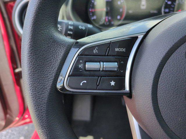 Photo of 2024 Currant Red Kia Forte