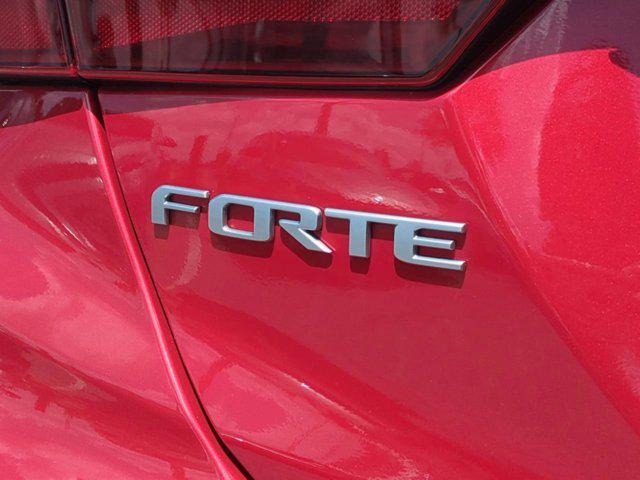 Photo of 2024 Currant Red Kia Forte