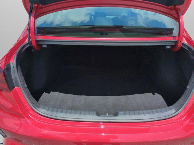 Photo of 2024 Currant Red Kia Forte