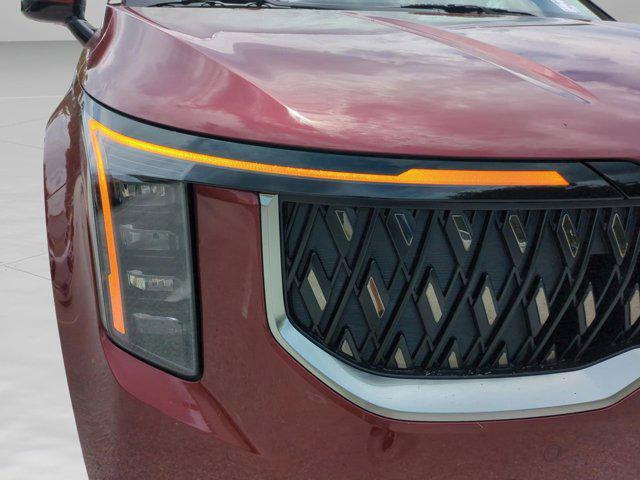 Photo of 2026 Flare Red Kia Carnival Hybrid