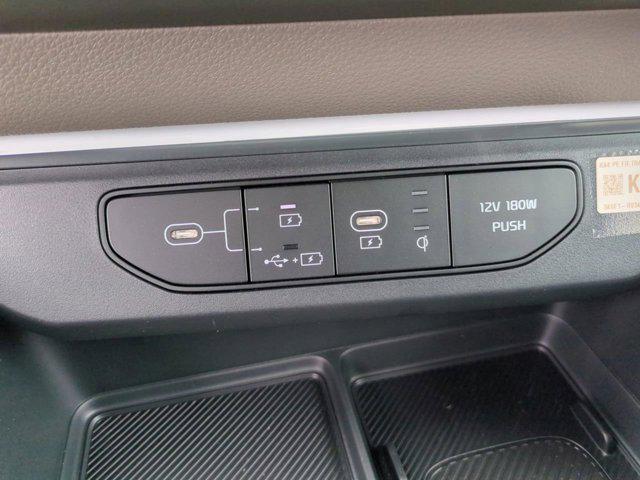 Photo of 2026 Flare Red Kia Carnival Hybrid
