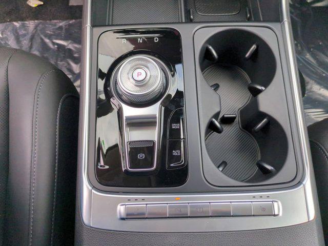 Photo of 2026 Flare Red Kia Carnival Hybrid