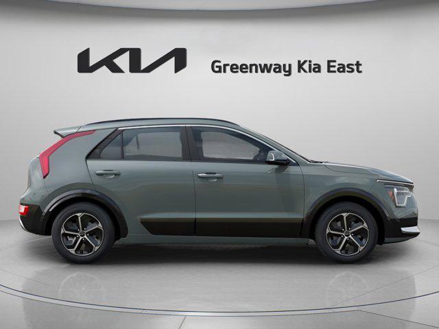 Photo of 2025 Cityscape Green Kia Niro
