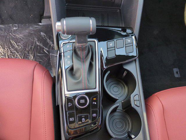 Photo of 2025 Ebony Black Kia Sportage