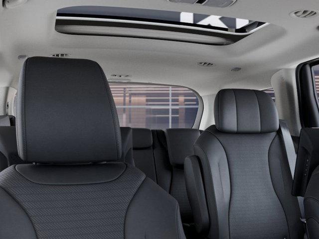 Photo of 2025 Ivory Silver Kia Carnival Hybrid