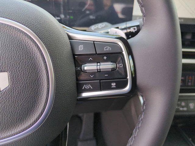 Photo of 2025 Ivory Silver Kia Carnival Hybrid