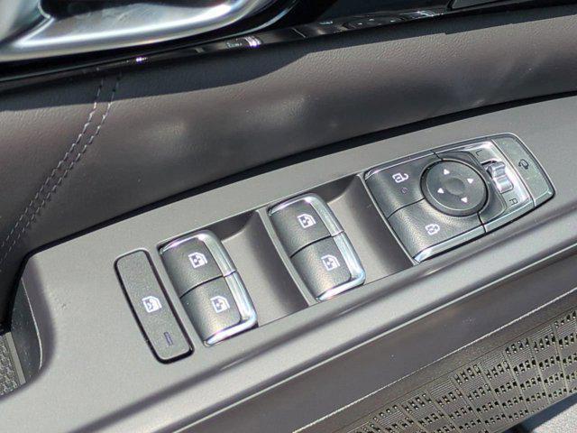 Photo of 2025 Ivory Silver Kia Carnival Hybrid