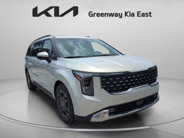 Photo of 2026 Ivory Silver Kia Carnival