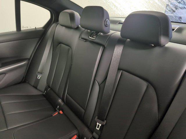 Photo of 2025 Jet Black BMW 330