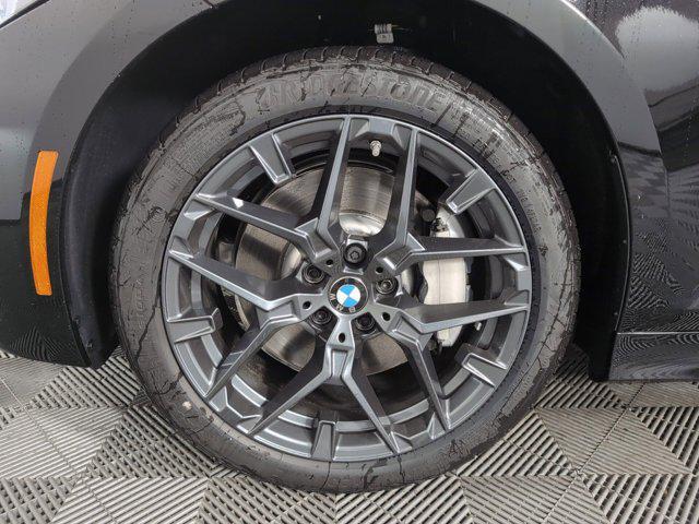 Photo of 2025 Jet Black BMW 330