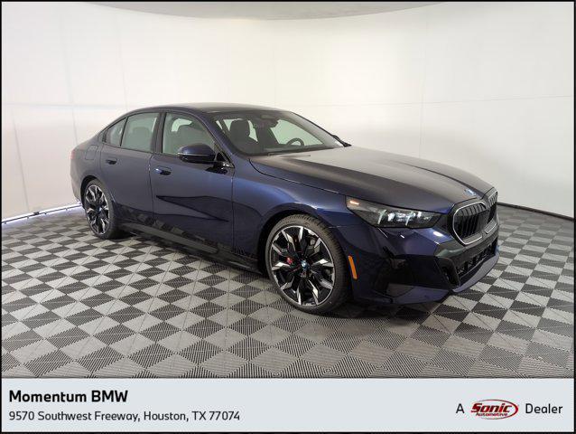 Photo of 2026 Tanzanite Blue II Metallic BMW 550e