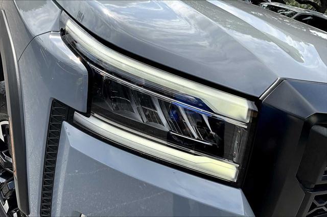 Photo of 2023 Boulder Gray Pearl Nissan Frontier