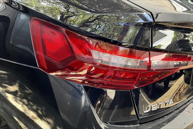 Photo of 2024 Deep Black Pearl Volkswagen Jetta