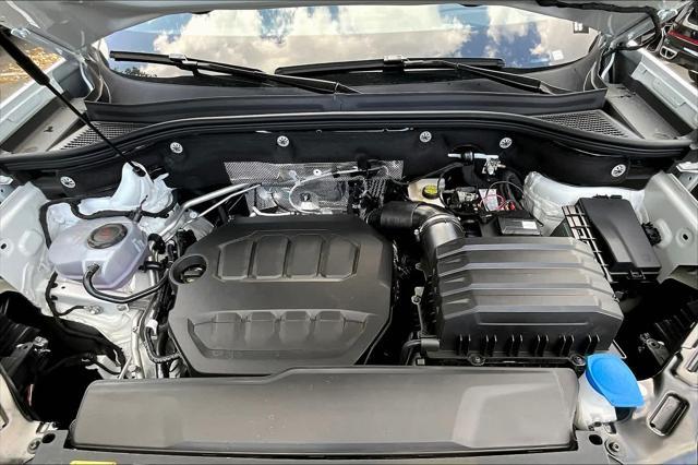 Photo of 2025 Opal White Pearl Volkswagen Atlas Cross Sport