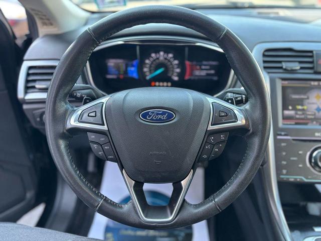 Photo of 2013 Tuxedo Black Metallic Ford Fusion