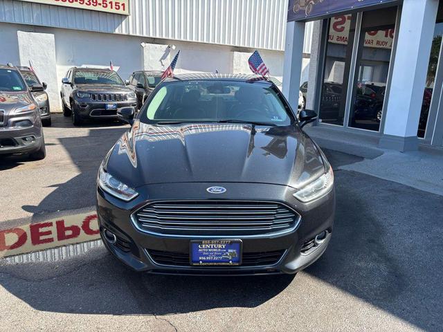 Photo of 2013 Tuxedo Black Metallic Ford Fusion