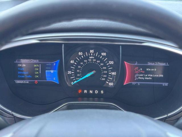 Photo of 2013 Tuxedo Black Metallic Ford Fusion