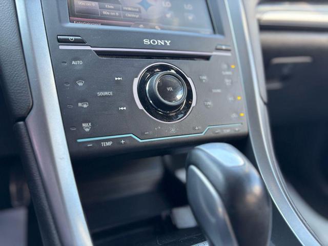 Photo of 2013 Tuxedo Black Metallic Ford Fusion