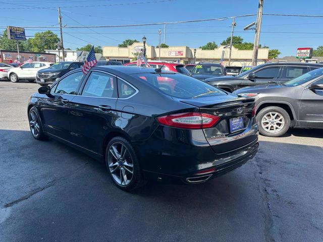 Photo of 2013 Tuxedo Black Metallic Ford Fusion