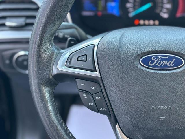 Photo of 2013 Tuxedo Black Metallic Ford Fusion