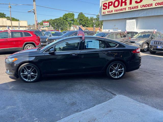 Photo of 2013 Tuxedo Black Metallic Ford Fusion