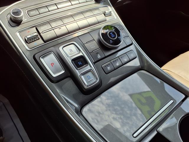 Photo of 2023 Calypso Red Hyundai SANTA FE HEV