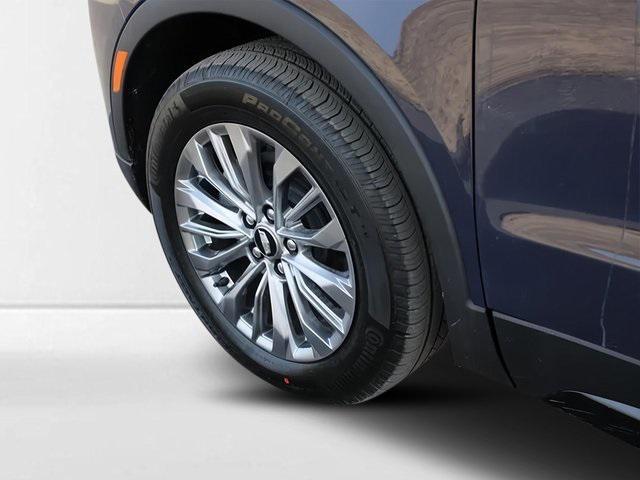 Photo of 2025 Midnight Sky Metallic Cadillac XT4