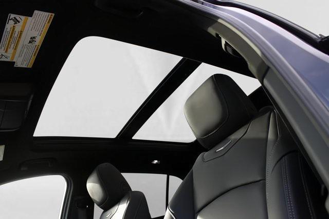 Photo of 2025 Midnight Sky Metallic Cadillac XT4
