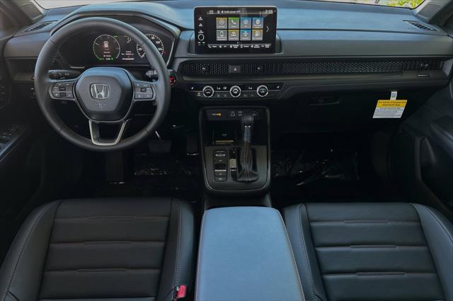 Photo of 2025 Silver Metallic Honda CR-V Hybrid