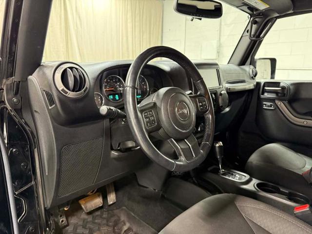 Photo of 2017 Black Clearcoat Jeep Wrangler Unlimited