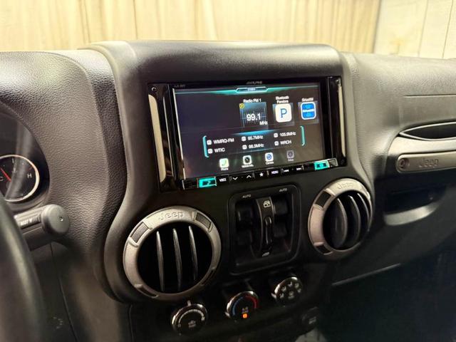 Photo of 2017 Black Clearcoat Jeep Wrangler Unlimited