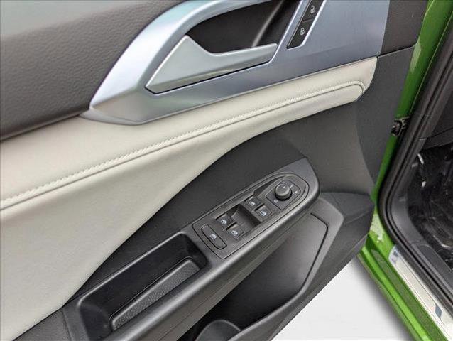 Photo of 2025 Bright Moss Green Metallic Volkswagen Taos