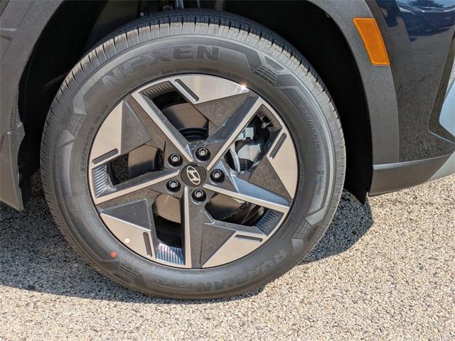 Photo of 2025 Deep Sea Hyundai TUCSON Hybrid