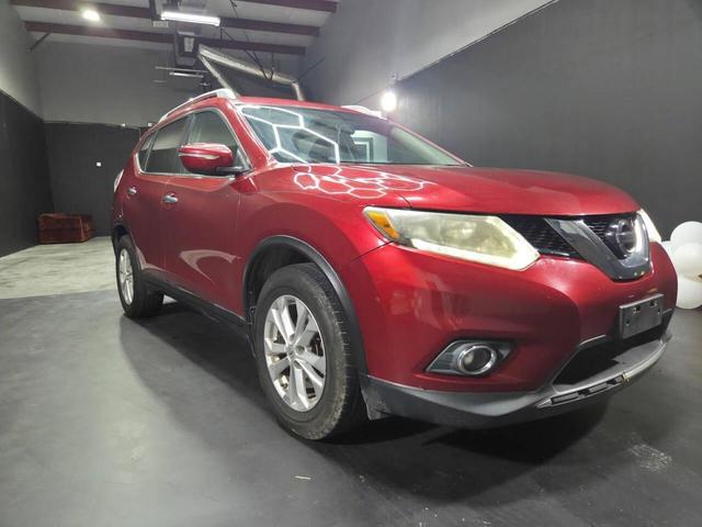 Photo of 2014 Cayenne Red Nissan Rogue