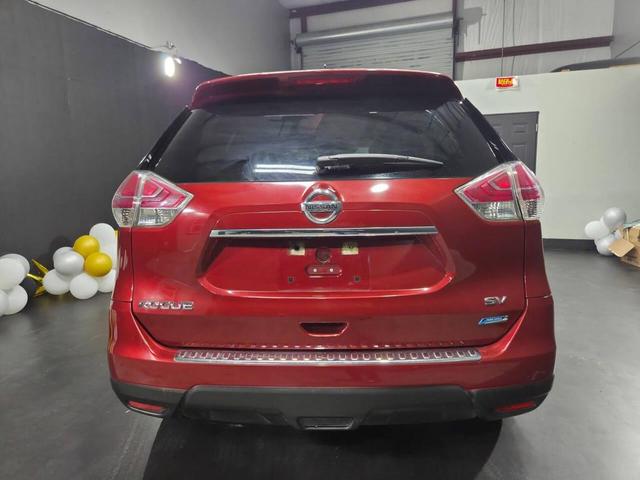 Photo of 2014 Cayenne Red Nissan Rogue