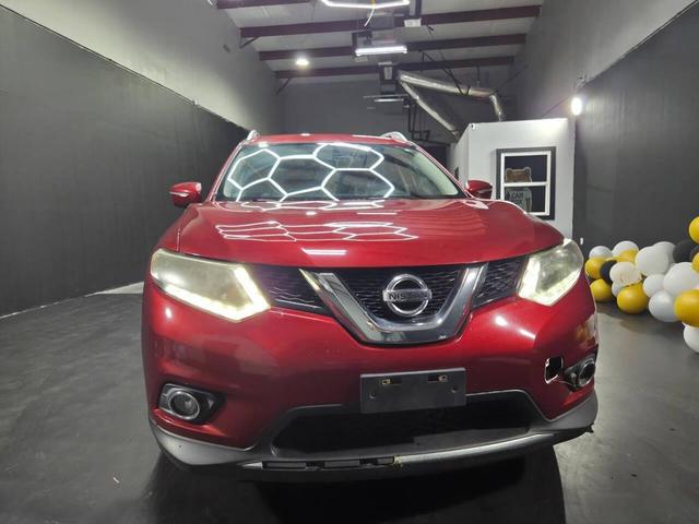 Photo of 2014 Cayenne Red Nissan Rogue