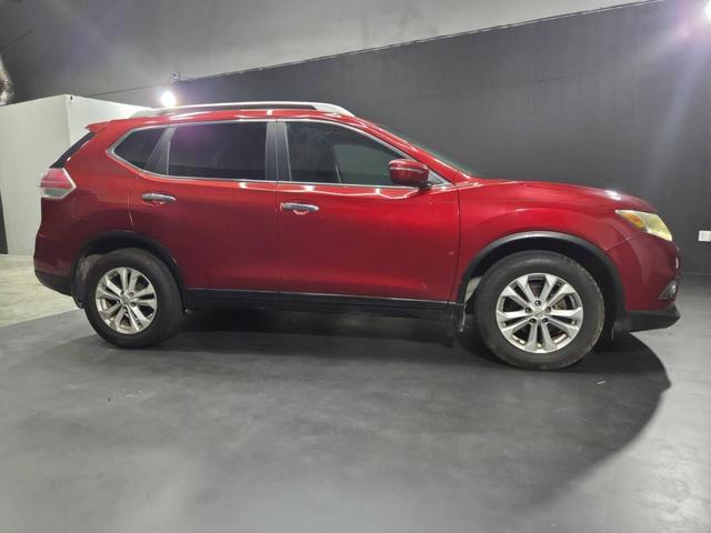 Photo of 2014 Cayenne Red Nissan Rogue