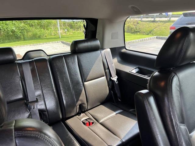 Photo of 2011 Silver Lining Metallic Cadillac Escalade