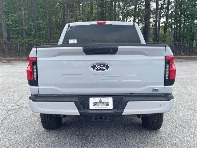Photo of 2025 White Metallic Ford F-150 Lightning