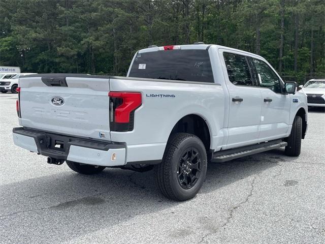 Photo of 2025 White Metallic Ford F-150 Lightning