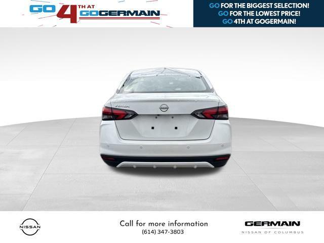 Photo of 2025 Aspen White Tricoat Nissan Versa
